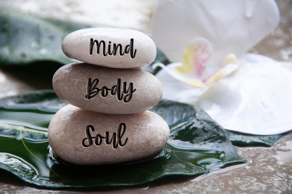 Mind,,Body,And,Soul,Words,Engraved,On,Zen,Stones,With